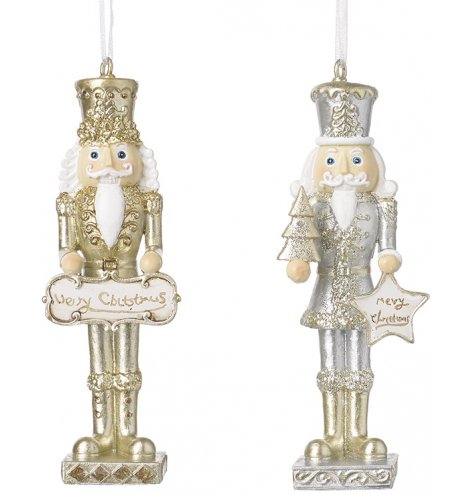 A mix of traditional themed hanging resin Nutcracker figures in Gold and Silver Tones, each set with added glittery touc