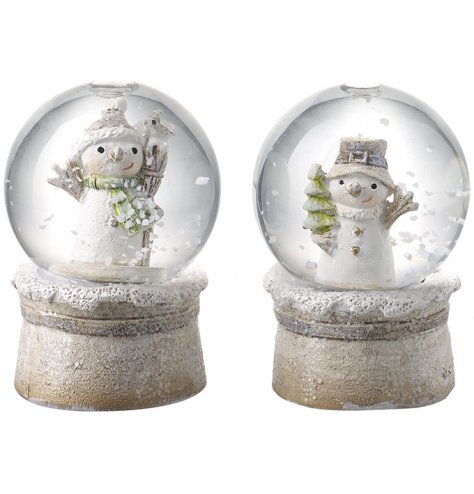 A mix of mini snow globes, both decorated with a snowman centre and flurry of snow when shook 