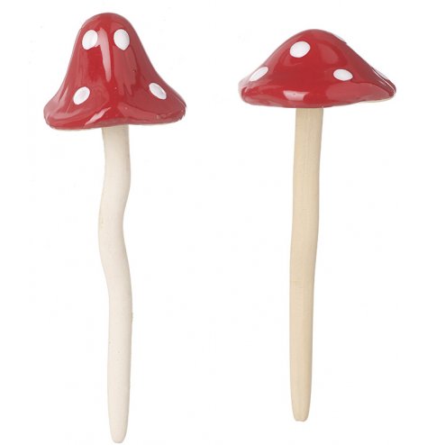 A mix of shaped ceramic toadstool decorations complete with a sleek glaze finish 