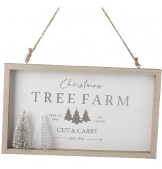 A gorgeously simple themed hanging wooden plaque with a Christmas Farm printed text and bristle tree to complete its loo