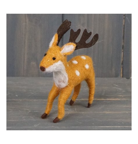  A charming felt reindeer complete with spots and a soft feel 
