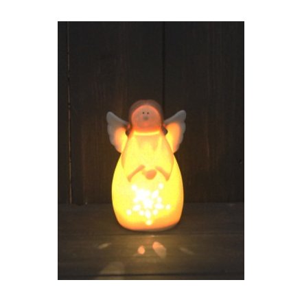 Complete with a warm glowing LED centre, this little angel has a smooth ceramic finish with neutral tones 