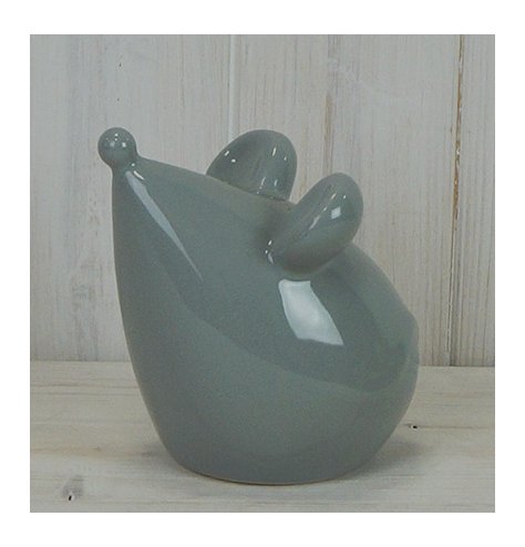 A small ceramic mouse with all grey tones, complete with a simplistic finish 
