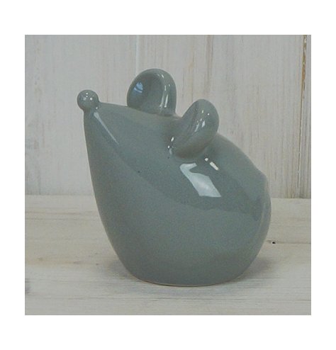 A small ceramic mouse with all grey tones, complete with a simplistic finish 