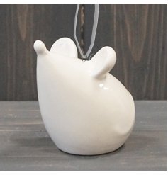   Perfect for placing within any home and providing a simplistic charm, a small ceramic mouse with a white glazing 