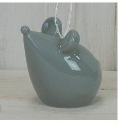 A small and simple ceramic mouse ornament set with a grey colouring and minimalistic finish 