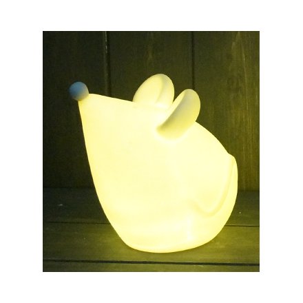 Perfect for placing within any home and providing a cosy glow to its space, a small ceramic mouse with a warming glow 