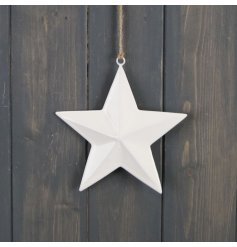 A sleek and simple hanging ceramic star with a white tone and jute string 