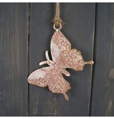   A sweet little hanging butterfly decoration with a pink floral decal to its centre