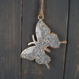   A sweet little hanging butterfly decoration with a blue floral decal to its centre