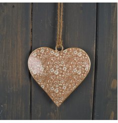  A sweet little hanging heart decoration with a yellow floral decal to its centre