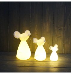 A small ceramic mouse with a simplistic look and bright warming glow to complete his look 