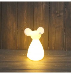 A small ceramic mouse with a simplistic look and bright warming glow to complete his look 