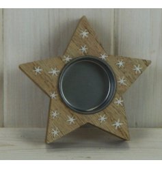 A small star shaped tlight holder featuring a white star printed decal and rustic finish 