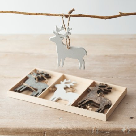  A Sleek and simple set of wooden reindeer cut decorations with jute string for hanging 