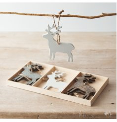  A Sleek and simple set of wooden reindeer cut decorations with jute string for hanging 