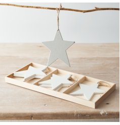  A Sleek and simple set of star cut decorations with jute string for hanging 