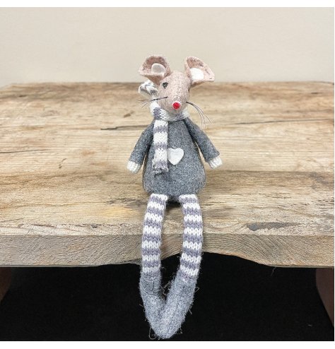 A adorable little fabric mouse complete with festive accents and a knitted scarf for extra warmth! 
