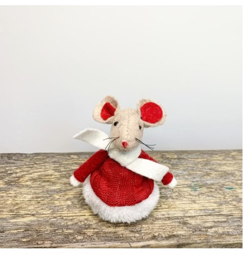 A cute little red and white mouse