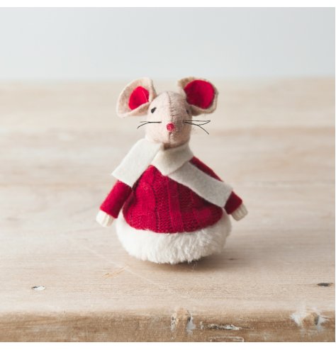 A cute little red and white mouse