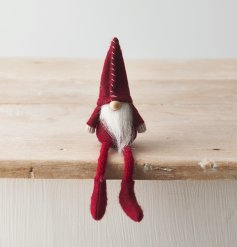 With dangly legs and a high pointed hat, this red toned gonk shelf sitter is perfect for the festive season! 