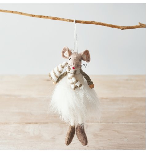 A adorable sitting fabric mouse with beige tones and a fluffy tutu to complete her look 