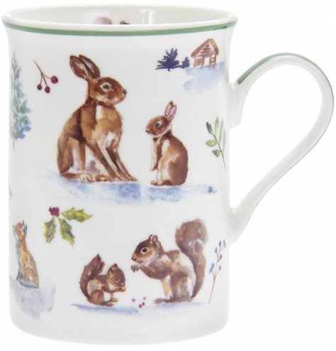 Part of a charming new range of home and kitchenwares, a watercolour inspired woodland scene printed onto a china mug 
