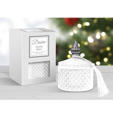A festive scented wax candle complete with a diamond ridge pot in a silver tone 