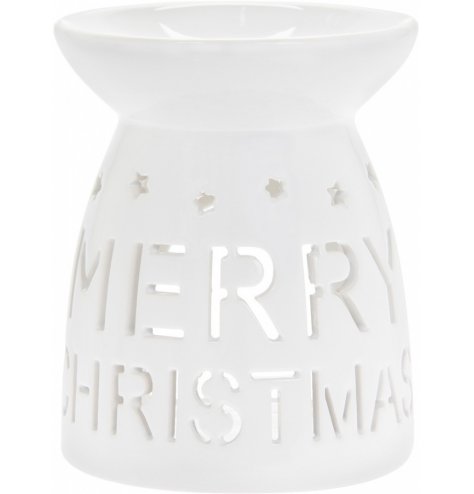 A simple white toned ceramic oil burner, decorated with a cut out Merry Christmas text and star decal 