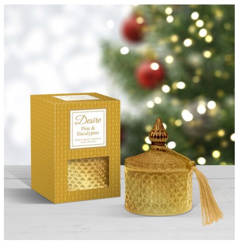 A festive scented wax candle complete with a diamond ridge pot and gold tip with a tassel finish 
