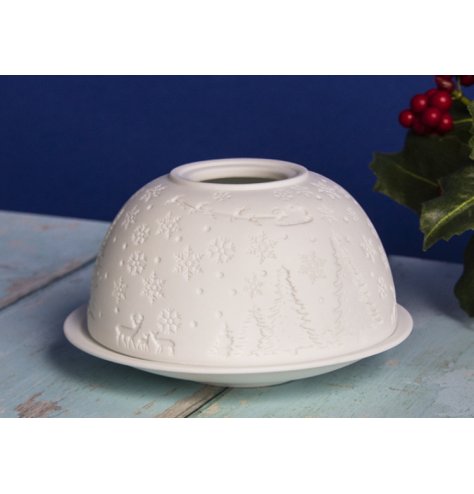 A ceramic based dome and plate tlight holder, displaying a beautiful embossed Christmas eve scene decal and white tone 