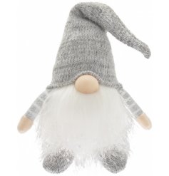  A cute little fabric gonk figure with a grey knitted hat and jumper. Perfectly finished with a warm glowing LED Centre 