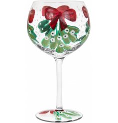  This large gin glass displays a stunning hand painted mistletoe and bow inspired decal