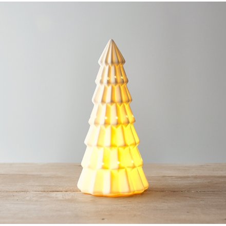  A gorgeously simple ceramic tree ornament with a warm glowing LED centre 