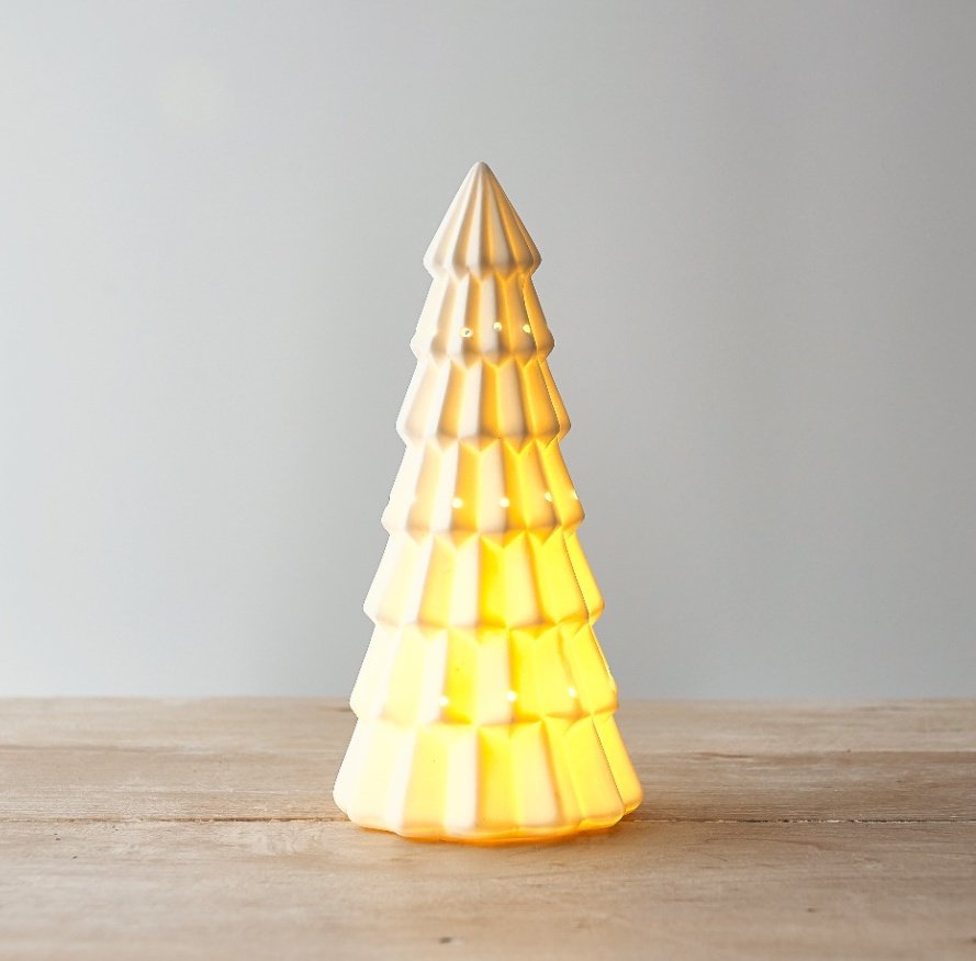  A gorgeously simple ceramic tree ornament with a warm glowing LED centre 