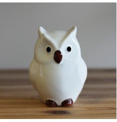  A sweet and simple posed perched ceramic owl named Oscar. 