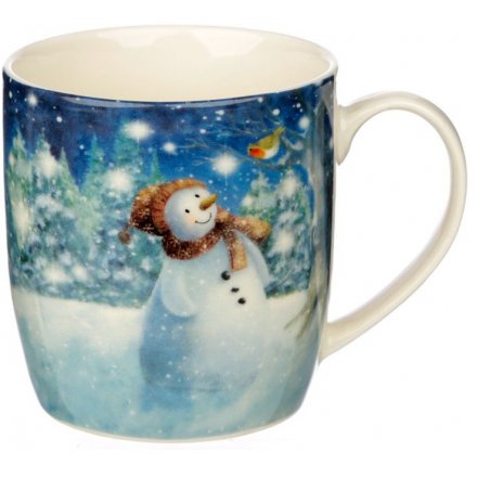 A cute themed ceramic mug featuring a snowman and penguin winter scene 