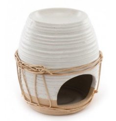 A sleek and neutral toned ceramic oil burner with a ribbed edging and added woven string decal 