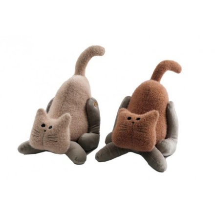 An assortment of plush cat themed doorstops in stretched poses 
