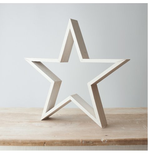 A natural wooden based star complete with a rough finish and white washed tone 