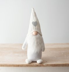  A sleek and chic sitting fabric gonk figure with all white details and a glittered heart hat 