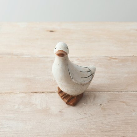 A small duck that is sure to add a cute charm to any shelf space of your home 