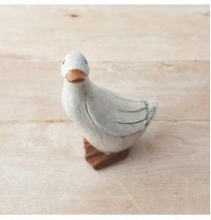  With his rustic features and sweet look, this duck is sure to add a cute charm to any shelf space of your home 