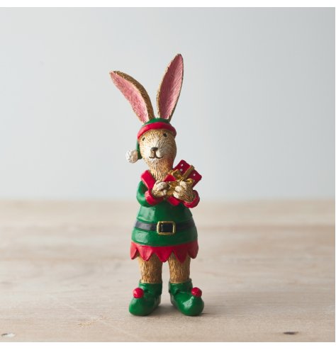 A beautifully detailed standing rabbit decoration. Complete with a present and elf costume