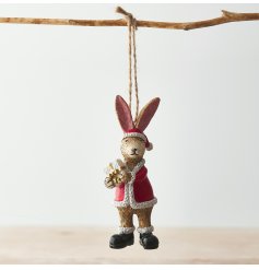 Perfect for the festive season, a hanging bunny with a santa outfit and present to complete his look 