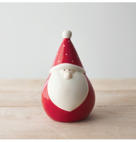 A sweet and simple ceramic gonk with a festive red colour and little polka dot decal  