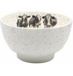  A quirky cow themed ceramic bowl with an added speckled finish