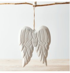  A chunky pair of wooden angel wings hung from a jute string, complete with an overly distressed finish and white wash t