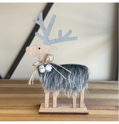 A festive wooden based reindeer featuring a faux fur trim body and added jingle bell feature 