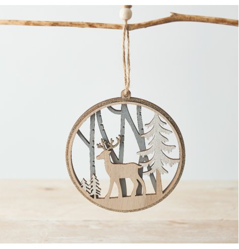 A jute string hung wooden decoration with a woodland scene cut decal and glitter edge trim 